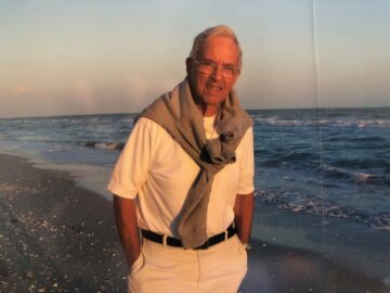 Dad-on-beach-in-Sanibel-w-sweater-around-his-shoulders-gorgeus-photo